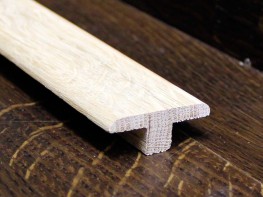 Массивный порог Т-образный накладной из дуба. Вернисаж (Спб)