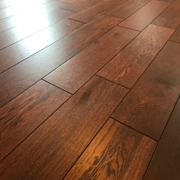 Укладка темной паркетной доски в Кировском районе