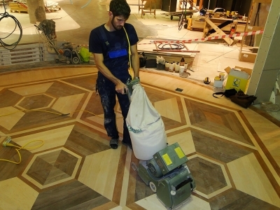 Первичная шлифовка паркетного пола